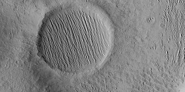 Yardangs, in a crater in Amazonis quadrangle (HiRISE)