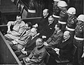 Seated in the second row at the Nuremberg trial