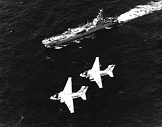 S-3As of VS-22 over Polnocny-class landing ship c1986.jpg