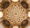 The ceiling of the tomb is embellished with Mughal frescoes.