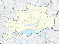 Mapa konturowa powiatu pszczyńskiego, blisko centrum na prawo znajduje się punkt z opisem „Brama Wybrańców”