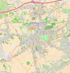 Mapa konturowa Łańcuta, w centrum znajduje się ikonka pałacu z opisem „Zamek Lubomirskich i Potockichw Łańcucie”