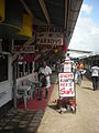 Image 42Butcher in the Central Market in Paramaribo with signs written in Dutch (from Suriname)