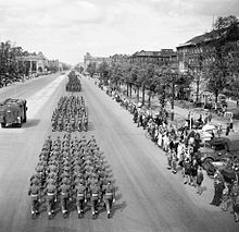 Three column of British troops marching down the Charlottenburg Chaussee in Berlin