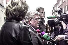 Labour Party Leader Eamon Gilmore, Deputy Leader Joan Burton and Labour TD John Lyons launched Labour's latest Stability Treaty poster today (7234460588).jpg