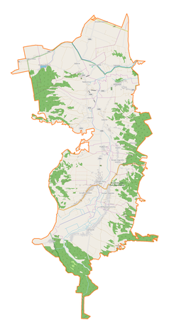 Mapa konturowa gminy Radecznica, u góry znajduje się punkt z opisem „Kościół św. Antoniego z Padwyi klasztor oo. bernardynów”