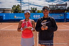 Photo of Risa Ozaki and Destanee Aiava with their ACT Clay Court International #1 trophies