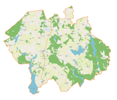Mapa konturowa gminy Dźwierzuty, blisko centrum na lewo znajduje się punkt z opisem „Dźwierzuty”