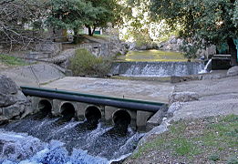 Barrage romain réutilisé, puits radier submersible.