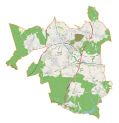 Mapa konturowa gminy Czerwionka-Leszczyny, po prawej znajduje się czarny trójkącik z opisem „Ramża”