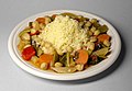 Image 5Couscous (Arabic: كسكس) with vegetables and chickpeas, the national dish of Algeria (from Culture of Algeria)