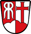 Gemeinde Westheim bei Augsburg Gespalten von Rot und Silber über einem Dreiberg in verwechselten Farben; vorne der silberne Doppelbuchstabe R, hinten ein aus der linken Kuppe des Dreibergs wachsendes rotes Tatzenkreuz.