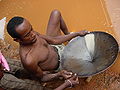 Man panning for gold in Madagascar