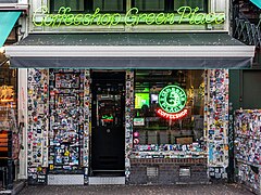 Coffeeshop Green Place façade covered with stickers in Amsterdam.jpg