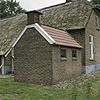 Hallenhuisboerderij in ambachtelijk-traditionele stijl, stookhok