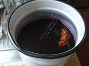 Chicha morada being prepared in Peru: unfermented chicha made from purple maize and boiled with pineapple and spices