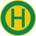 rundes Schild mit grünem Rand und einem grünen Buchstaben H auf gelbem Grund