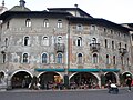 Casa Cazuffi in casa Rella na osrednjem trgu Piazza Duomo