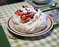 Image 13Pavlova, a popular New Zealand dessert, garnished with cream and strawberries. (from Culture of New Zealand)