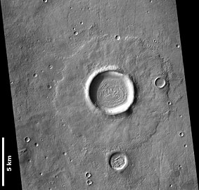 The small pedestal crater in the northwestern floor of Slipher