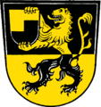 Gemeinde Kirchdorf a.Inn In von Schwarz und Gold geteiltem Schild ein Löwe in verwechselten Farben, der ein durch eine linke Stufe von Gold und Schwarz geteiltes Schildchen in den Pranken hält.