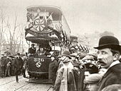 Trams crossing bridge.