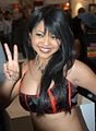 clothed and smiling porn actress Mika Tan: 3 uses