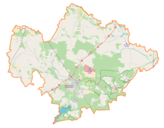 Mapa konturowa powiatu tomaszowskiego, po prawej znajduje się punkt z opisem „Tłumy”