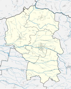 Mapa konturowa powiatu kluczborskiego, po lewej znajduje się punkt z opisem „Wołczyn”