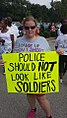 A woman protesting against the militarization of police, August 17, 2014