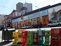Enlargement of One Hundred Years by James Leong, photographed in 2012 as a vinyl wrap on the Hogan & Vest building near Stockton and Washington.