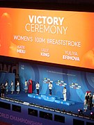 Budapest2017 fina world championships 100breaststroke Victory Ceremony Efimova (Russia) Meili (USA) King (USA).jpg