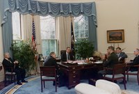 George H. W. Bush seated at the C&O desk, 1990