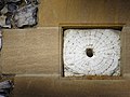 Sundial preserved amid a newer wall at SS Peter & Paul's in West Clandon, Surrey, England