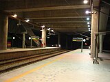 The Putrajaya & Cyberjaya ERL Station platform at night.