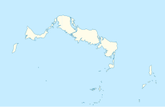 Mapa konturowa Turks i Caicos, blisko prawej krawiędzi nieco na dole znajduje się punkt z opisem „Cockburn Town”