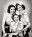 Maxene Andrews (top left), with her sisters LaVerne (top right), and Patty (center)