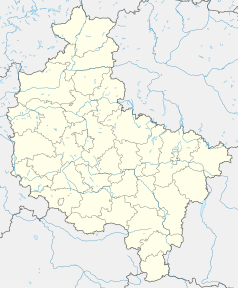 Mapa konturowa województwa wielkopolskiego, blisko centrum na lewo znajduje się punkt z opisem „Przeźmierowo”