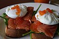 Poached eggs with smoked salmon, spinach and wholegrain bread