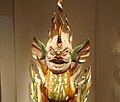 A sancai-glazed earthenware tomb guardian, 8th century, Tang Dynasty