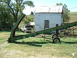 Grain conveyor on a farm near Belle