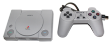 A PlayStation Classic console and controller against a pure white background.