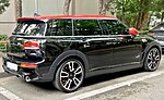 Mini Clubman JCW, demonstrating its split boot doors