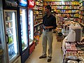 Pashtun man shopping at a store in Islamabad, Pakistan