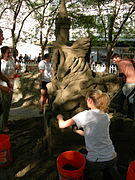 A woman sculpting sand in Seattle's Westlake Park. Image used in a Clipper Vacations Magazine article on Seattle tourism.