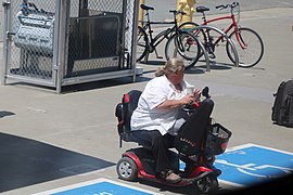 Handicapped boarding at convenient spot on Caltrain.jpg