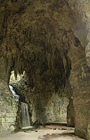 A gallery of the former quarry has been transformed into a grotto with a 20-meter high artificial waterfall.