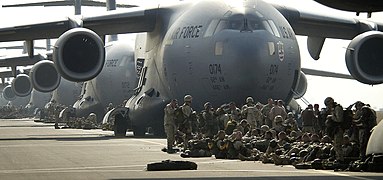 U.S. Army paratroopers of the 173rd Airborne Brigade prepare to board C-17 Globemaster III's in support of Operation Iraqi Freedom on March 23, 2003 at Aviano Air Base, Italy.jpg