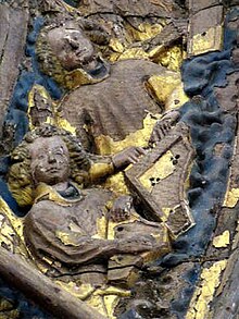 Prima raffigurazione conosciuta di un clavicembalo, scultura d'altare proveniente dalla cattedrale di Minden. L'angelo di sinistra suona un salterio.