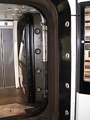 IC2, IC3 and IR4, The driver's window and the driver's table moved aside interconnection, Two IC3 trains coupled together, the front door swung aside. Notice the large pins (retracted) which are responsible for keeping the door shut when the cab is used